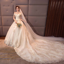 Load image into Gallery viewer, Tremble the same type of bride in 2019, a word shoulder wedding dress is thin, simple and long tail Hepburn Star Spring